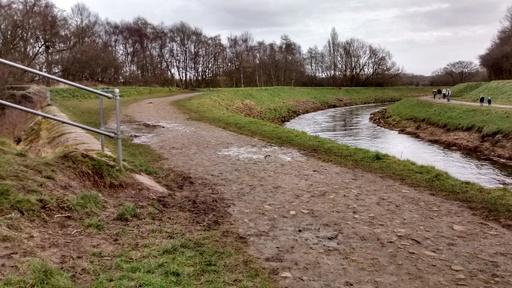 Weir of stone built in 1841 to protect River Mersey embankment in times of flood waters