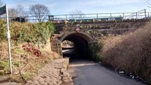 Cut Hole Bridge, the railway (1849) now Metrolink runs parallel to the canal or "cut"