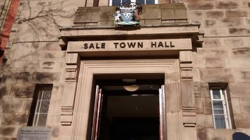 Coat of arms above entrance to Sale Town Hall where the Trafford Register Office (Births, Marriages & Deaths) is located