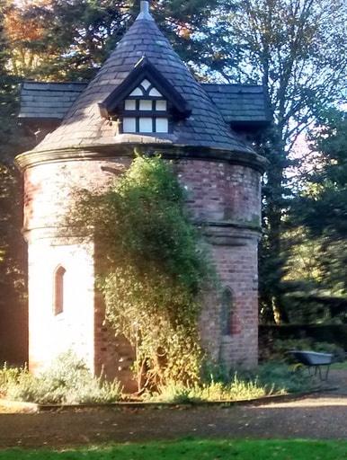 Sale Old Hall Dovecote in Walkden Gardens in dazzling autumn sunshine