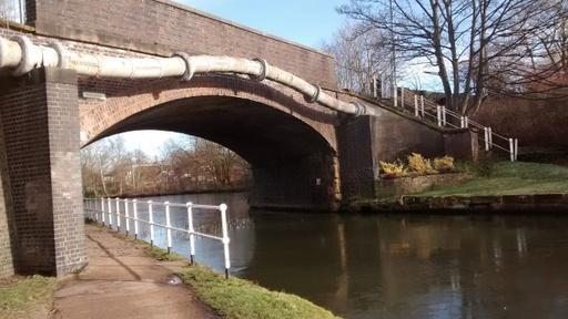 Dane Road Bridge, "White's Bridge", crossing Bridgewater canal (1766) and railway (1849) now Metrolink